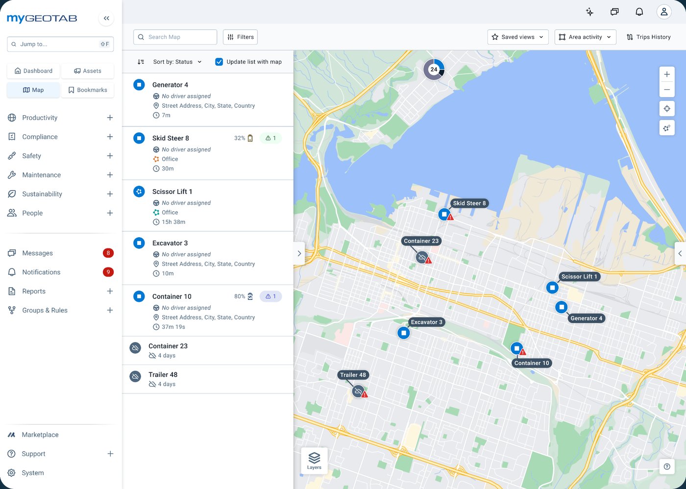 MyGeotab map view with an asset list showing a generator, skid steer, scissor lift, excavator, and containers placed on a city map